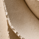 Macro detail of EMBRACE, revealing handcrafted texture, organic edges and layered sculptural surfaces.