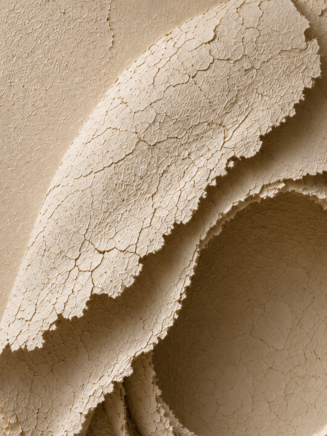 Macro detail of HOME, revealing handcrafted texture, organic cracks and layered sculptural surfaces.